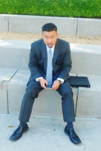Lawyer on phone sits and stares at me in downtown LA accross street from city hall and near 2 courts.