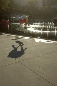 skateboarding trick, in park, LA teen, biy, shadow, mid air fun