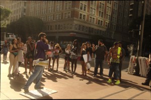 man with loud speaker protest Slutwalk