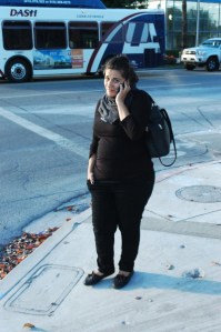 +female on cell phone looks irritated