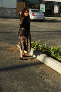 middle ages woman looks perturb in parking lot, Hollywood, CA
