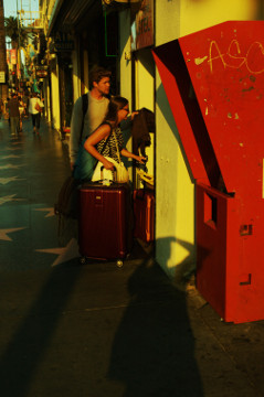 forgien couple with luggage