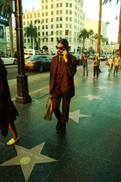 30 something man with bread & in a suit