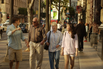 street scene Friday evening friends walk & talk
