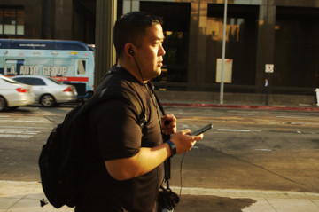 middle aged man on I phone Flower St