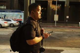 middle aged man on I phone Flower St